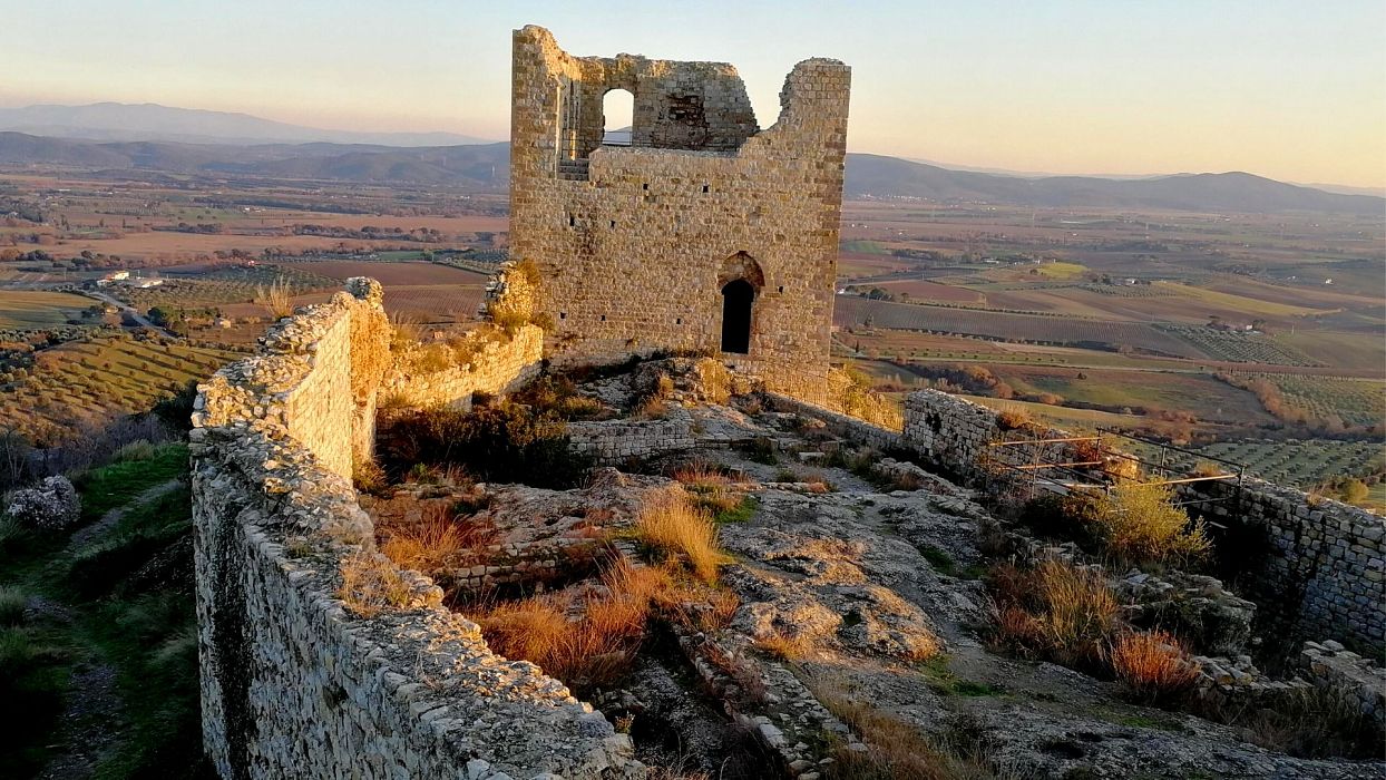 The medieval tower of Roccatederighi at sunset, Maremma